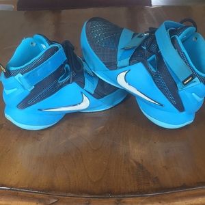 Kids, Blue and black Nike Lebron Basketball shoes